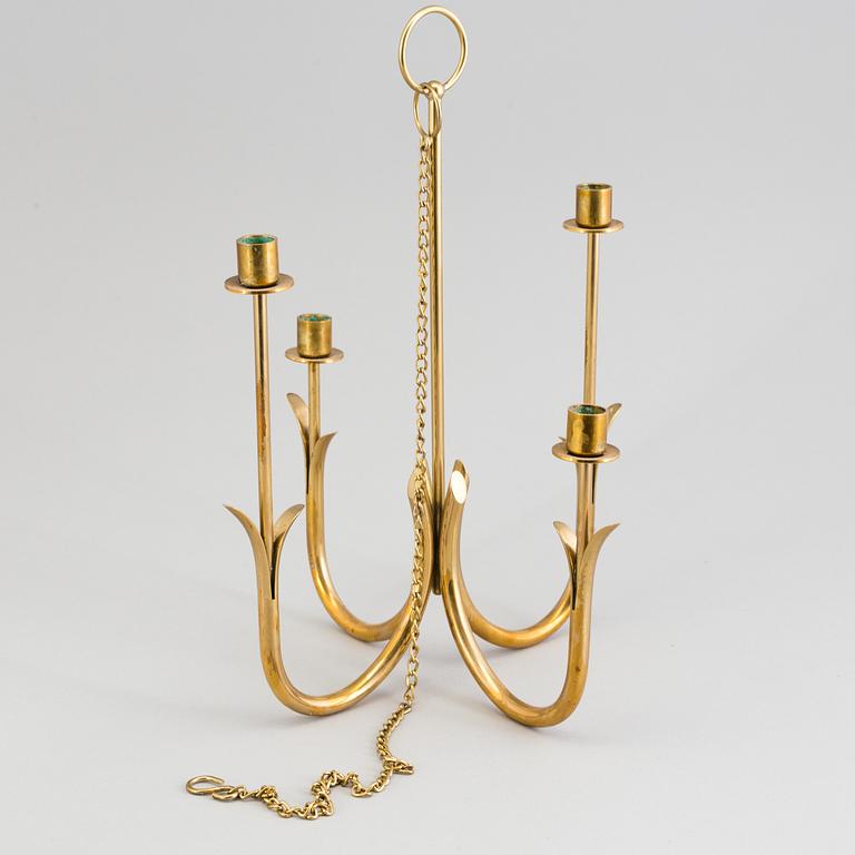 A brass candelabrum by Gunnar Ander for Ystad Metall.