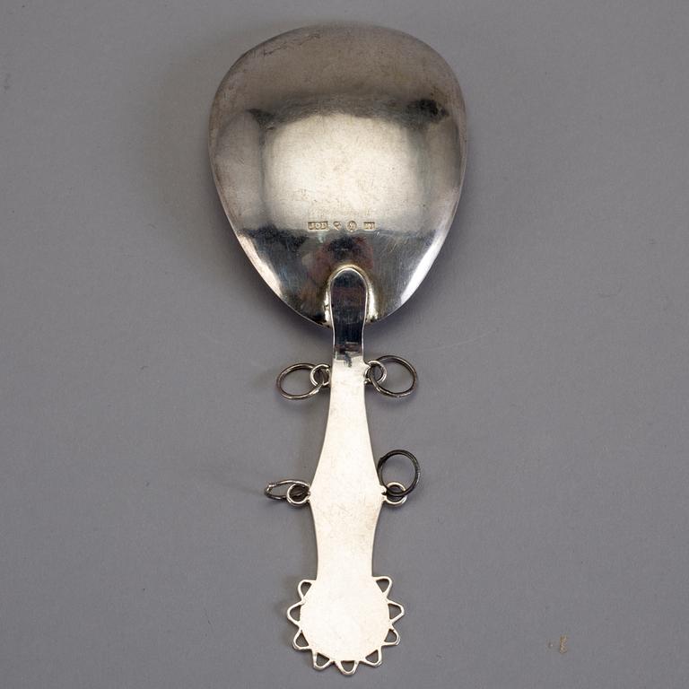 SKED, silver, Johan Olof Degerman, Haparanda, 1887. Vikt 26 gram.