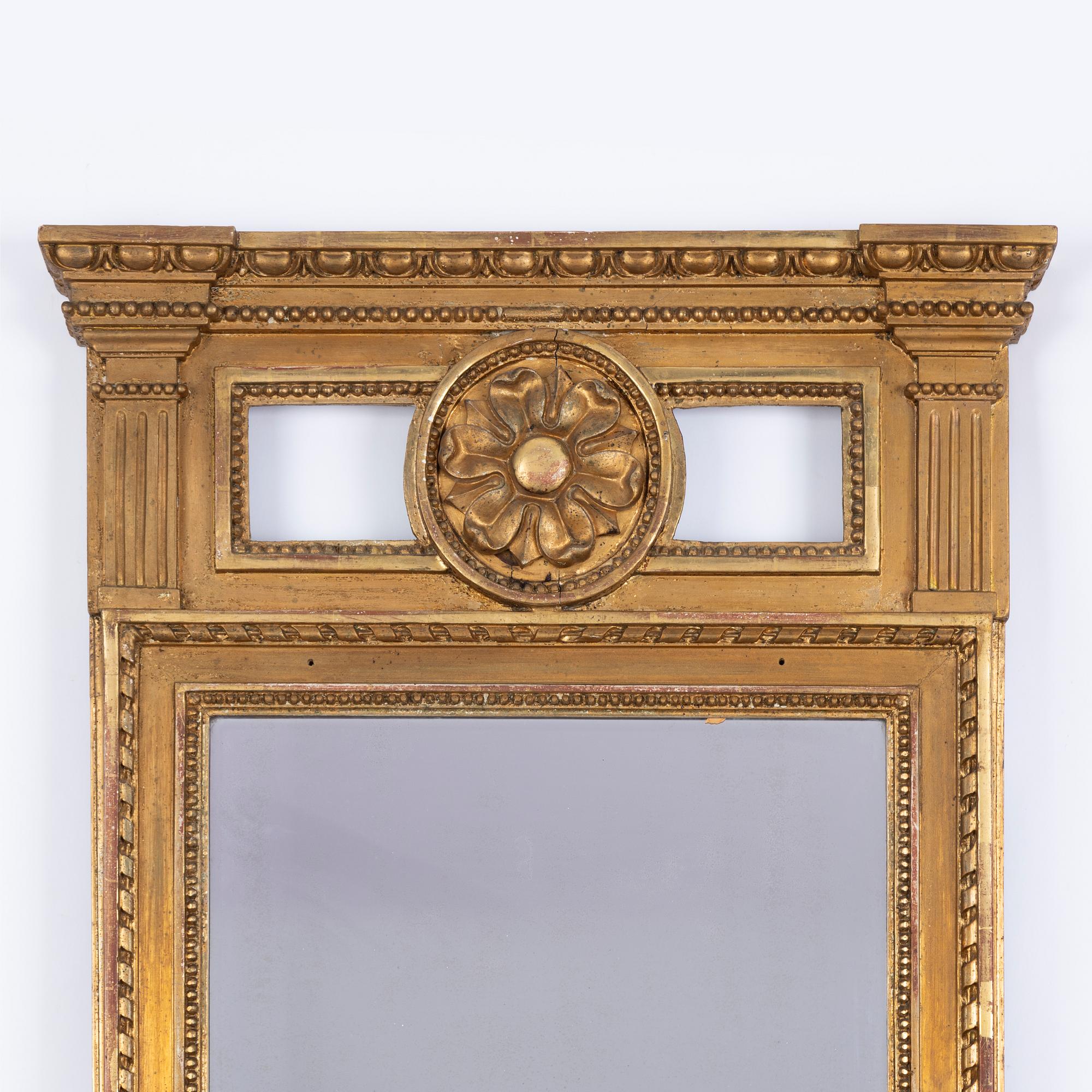 A late Gustavian mirror, circa 1800.