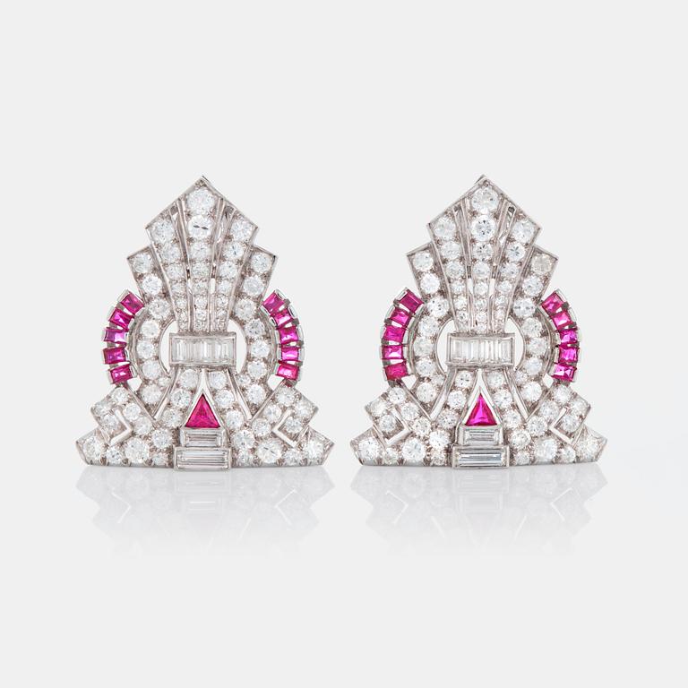 Two brooches/a double-clip set with round brilliant-, eight- and baguette-cut diamonds and rubies.