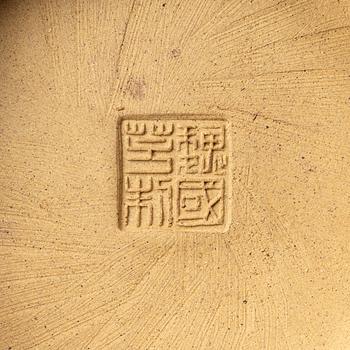 A group of three bright yellow yixing 'Gongfu' teapots, China, 1990s.