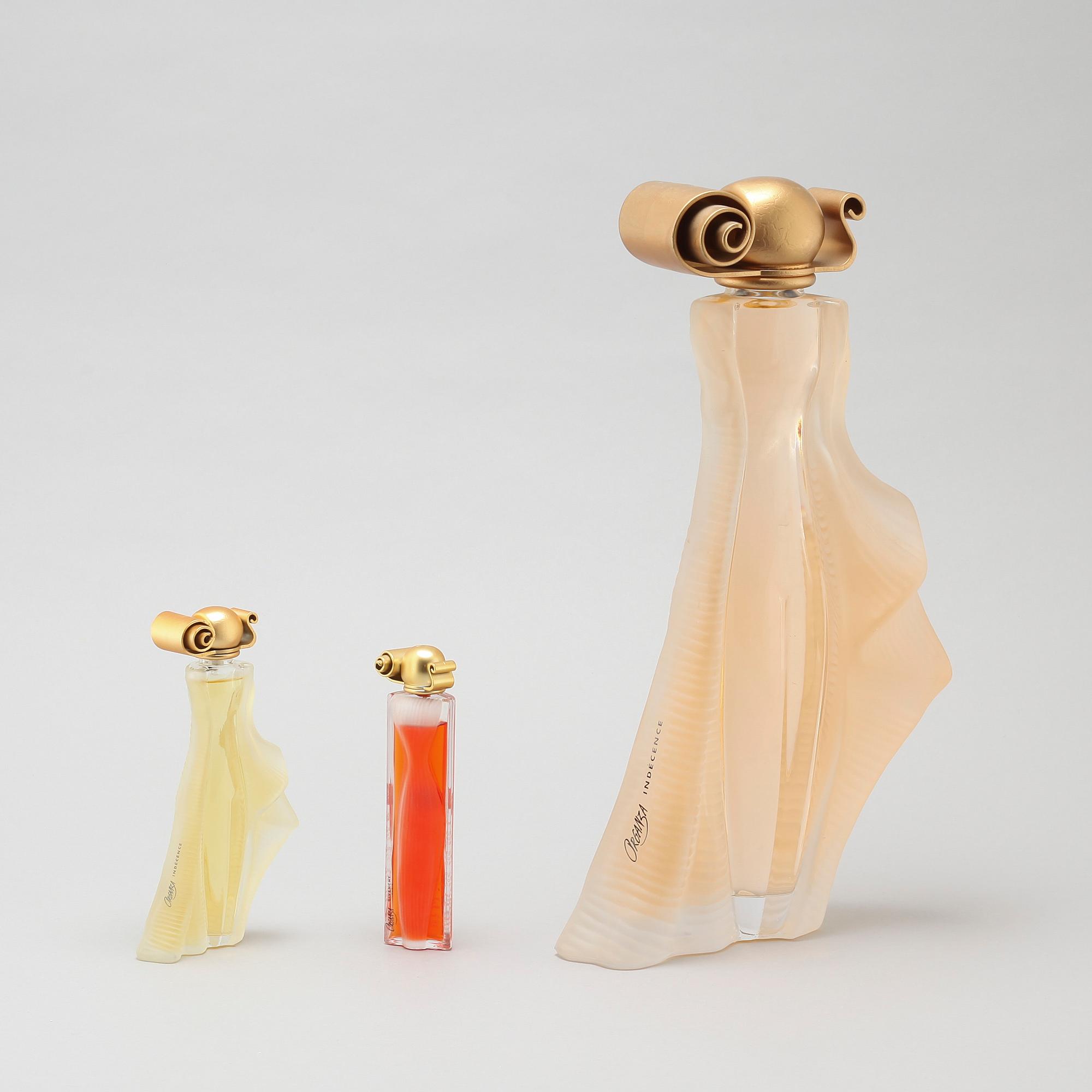 GIVENCHY, factices, three perfumebottles.