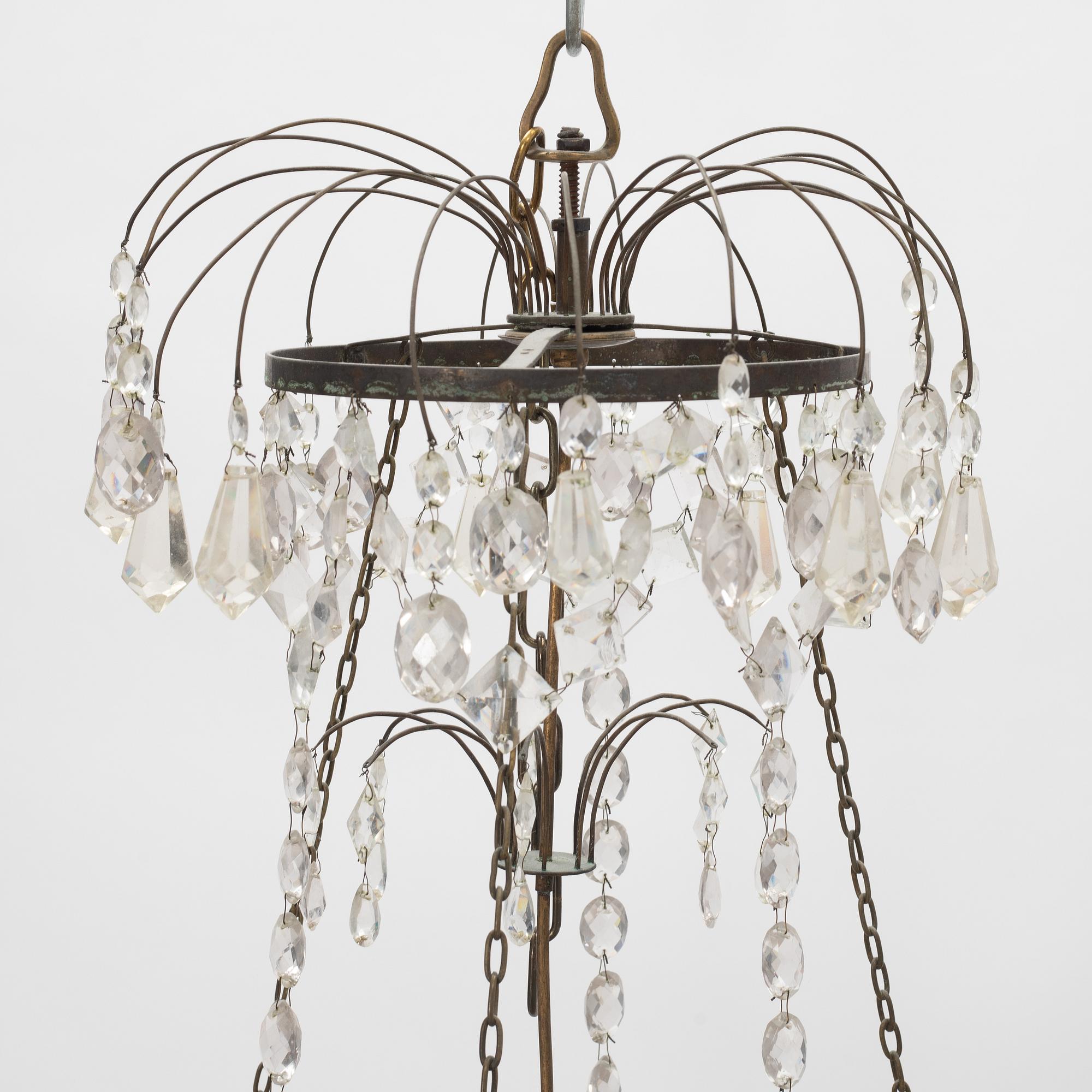 A Gustavian style chandelier, around the year 1900 incorporating older elements.