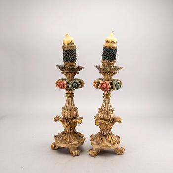 A pair mid 20th century wood candle sticks from Paoletti, Firenze Italy.