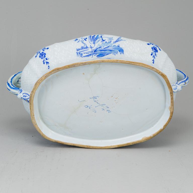 A Swedish Rörstrand faience tureen with cover and stand, 18th Century.