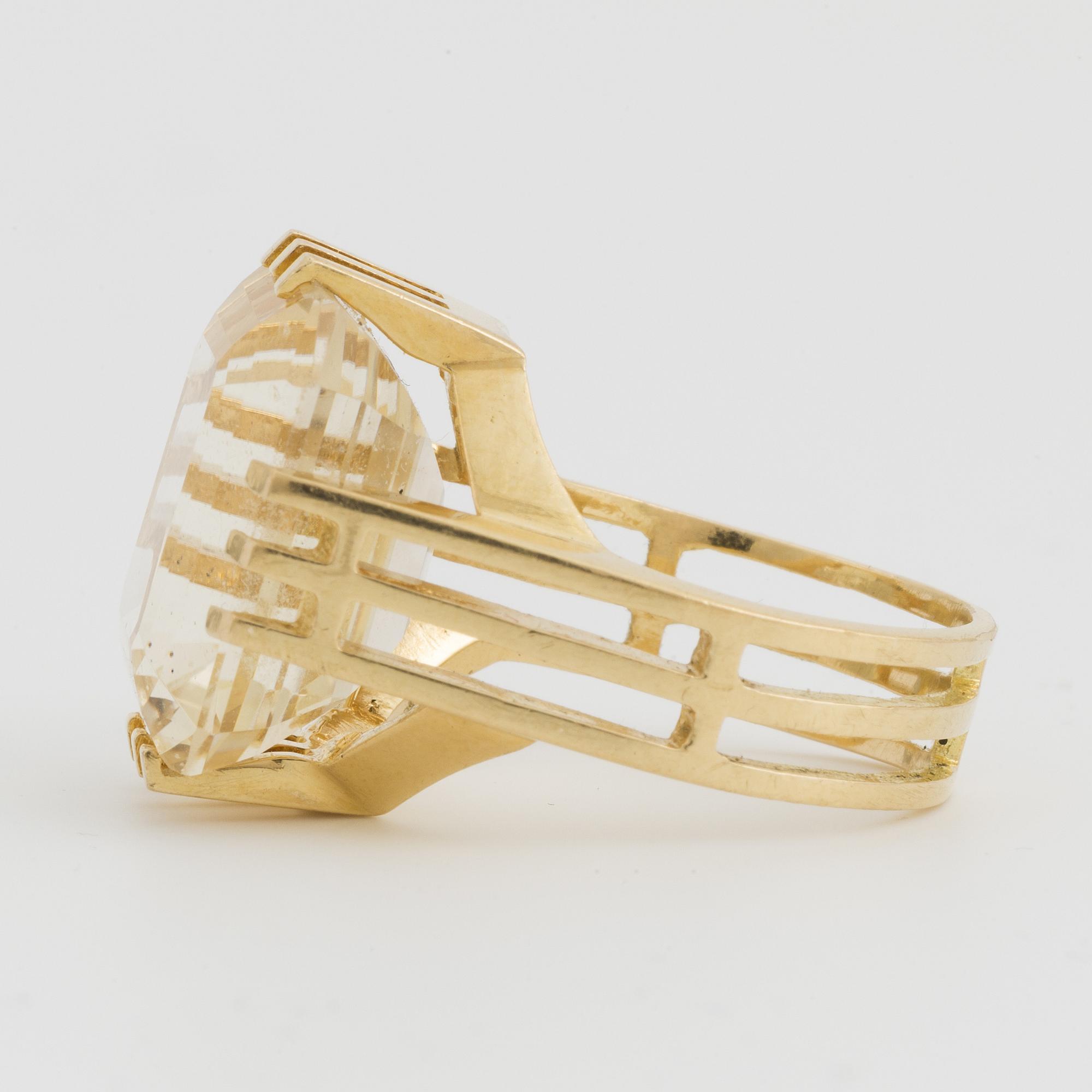 An emerald-cut citrine.