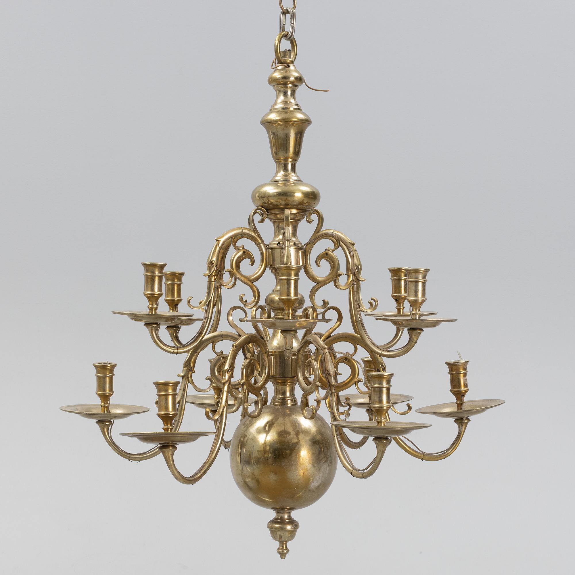 A brass Baroque style chandelier, 20th Century.