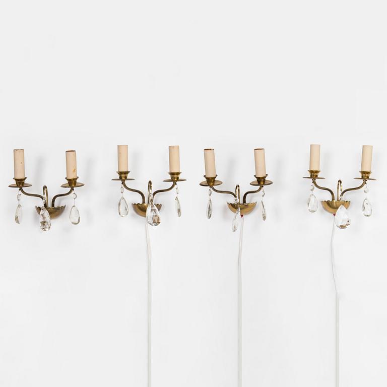 Four of mid-20th century wall sconces.
