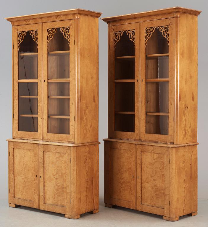 A pair of Swedish Empire mid 19th century bookcases.