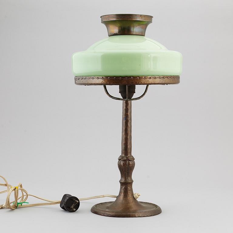 An copper table light, first half of the 20th century.