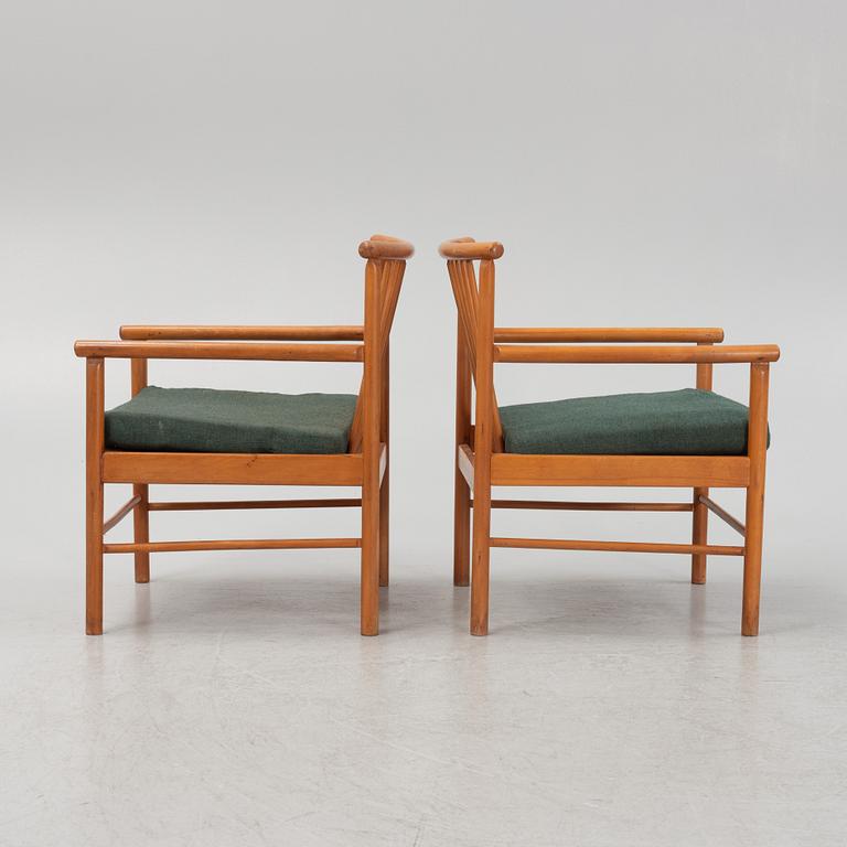 A pair of armchairs, mid 20th Century.