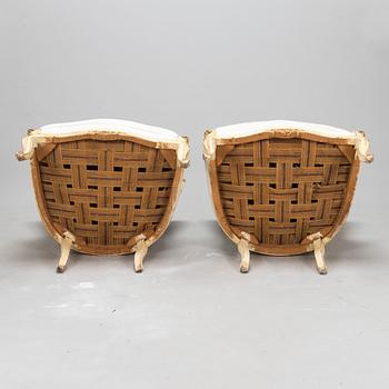 A pair of louis quinze style bergerer armchairs, first part of the 20th century.