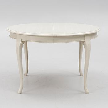 A Rococo style dining table and twelve chairs, KA Roos, Helsingborg, modern production.