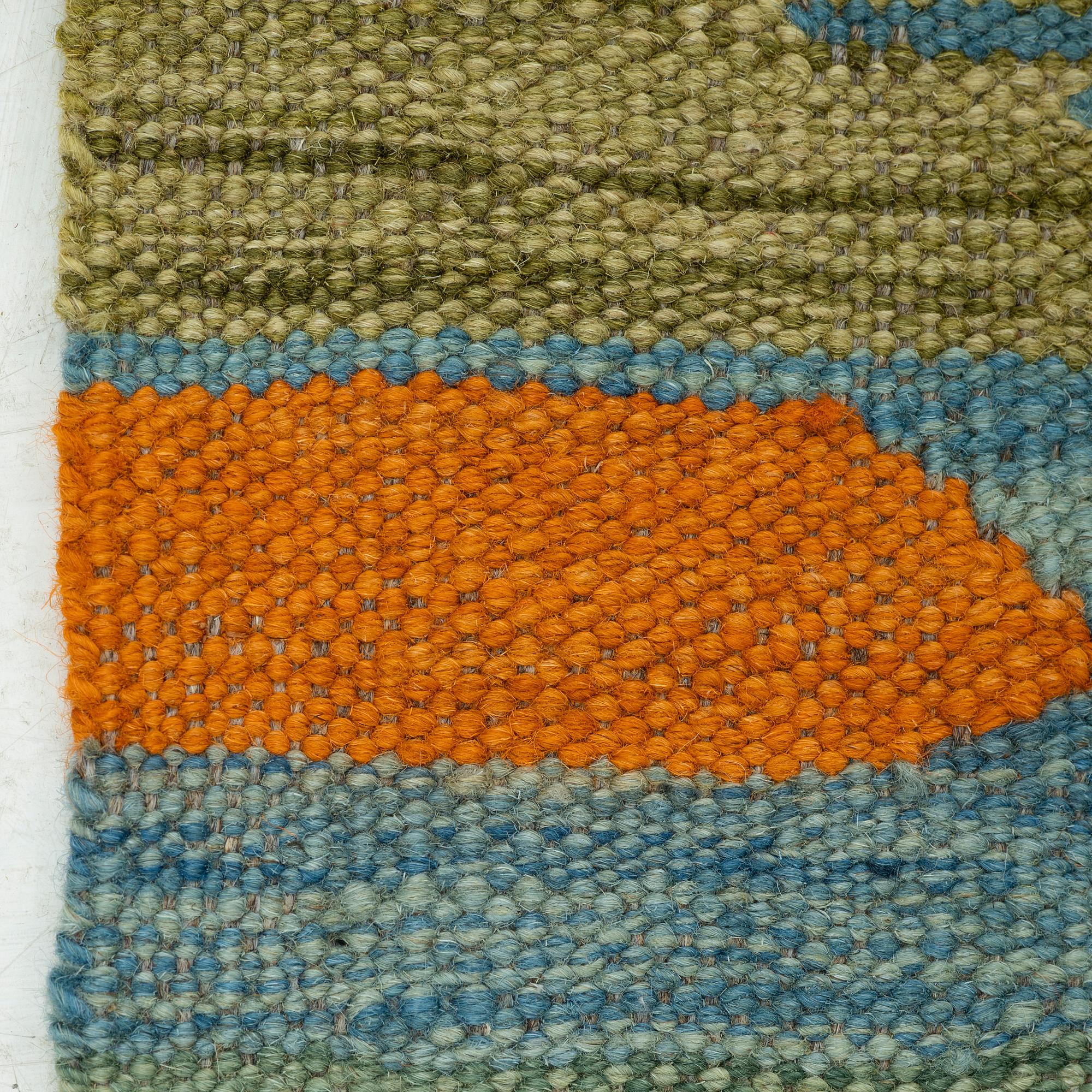 A kilim rug, 247 x 170 cm.