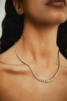 An 18K white gold and old-cut diamond rivière necklace.