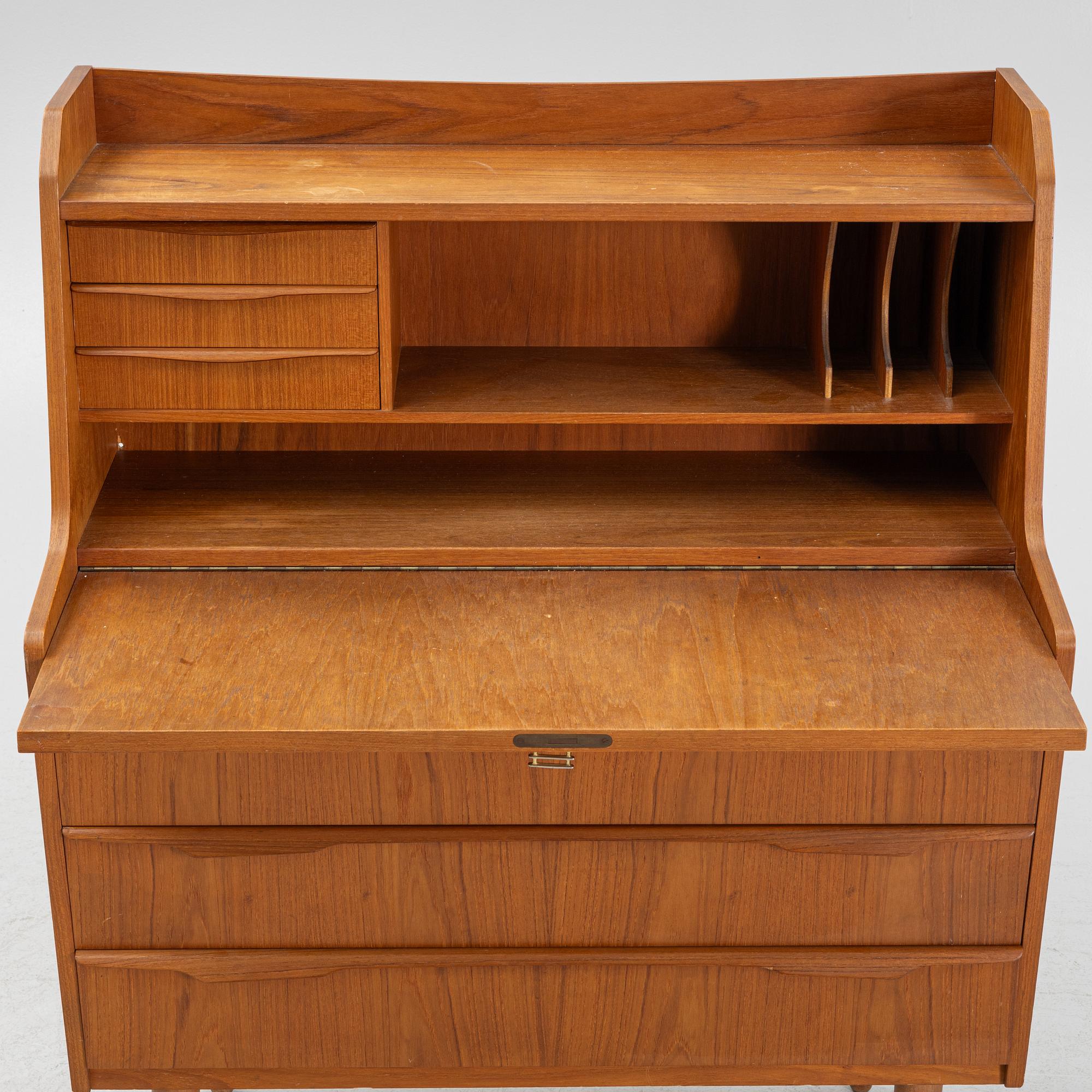 A teak writing desk, 1950-60s.