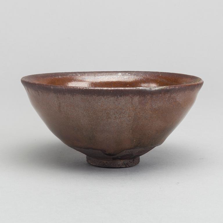 A Chinese glazed stoneware Song Dynasty temmoku bowl.