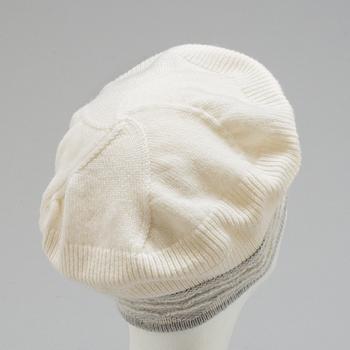 CHANEL, a knitted cashmere hat.