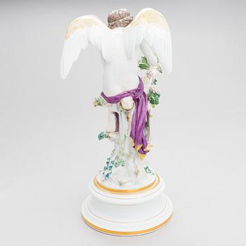 A Meissen Cupid porcelaine figure, 20th century.