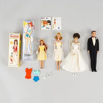 A collection of four Mattel 1960's Barbiedolls with accessories.