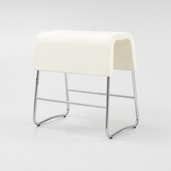 A leather upholstered stool by Sandin och Bülow for Materia 2001.