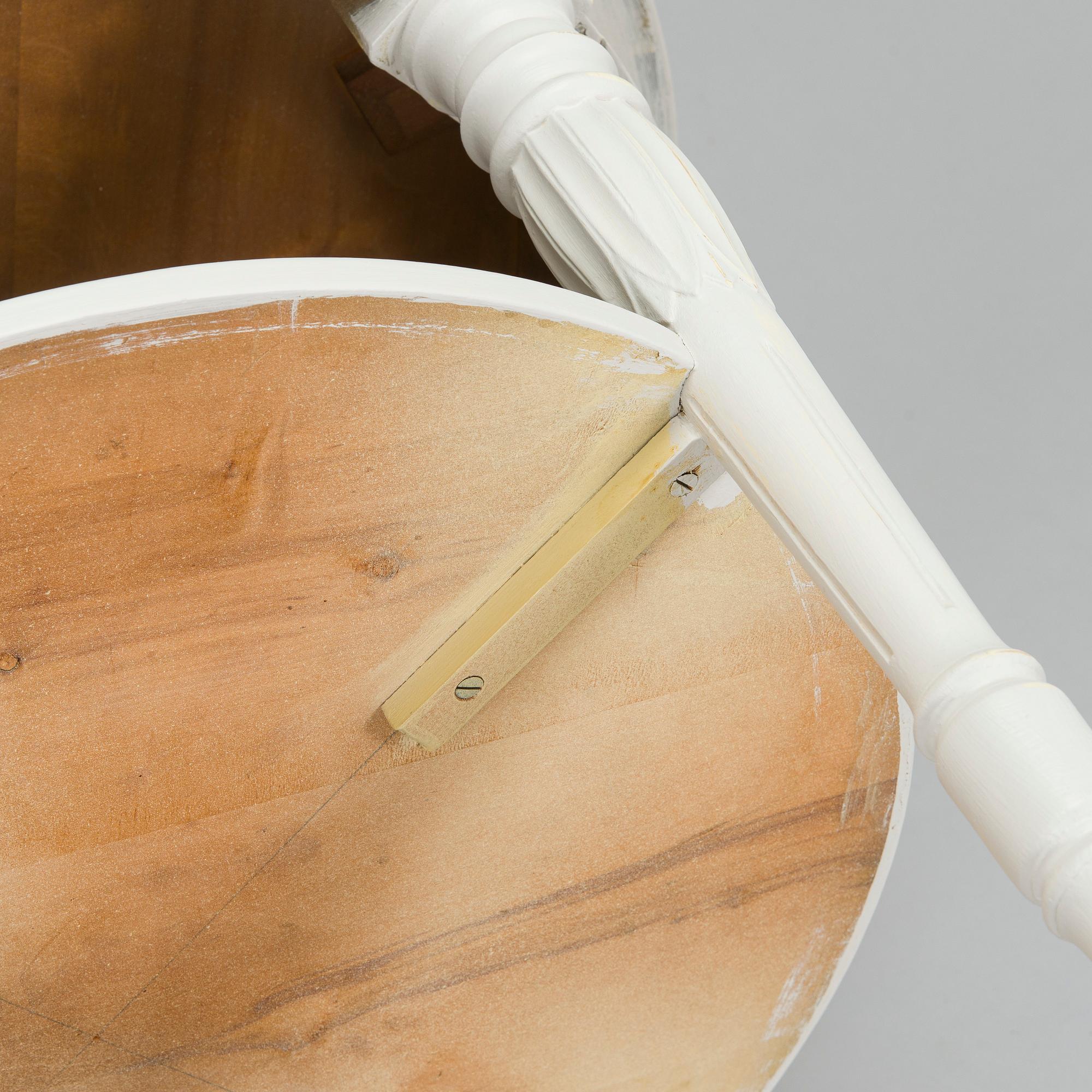 A Gustavian style small round table from first half of the 20th century.