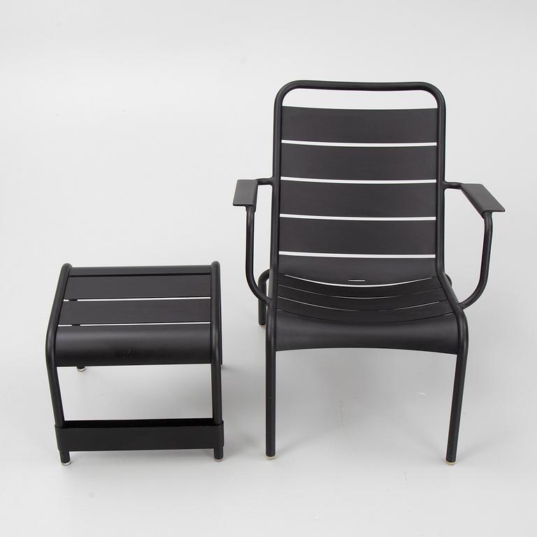 A 'Luxembourg' lounge chair and a foot stool, Fermob.