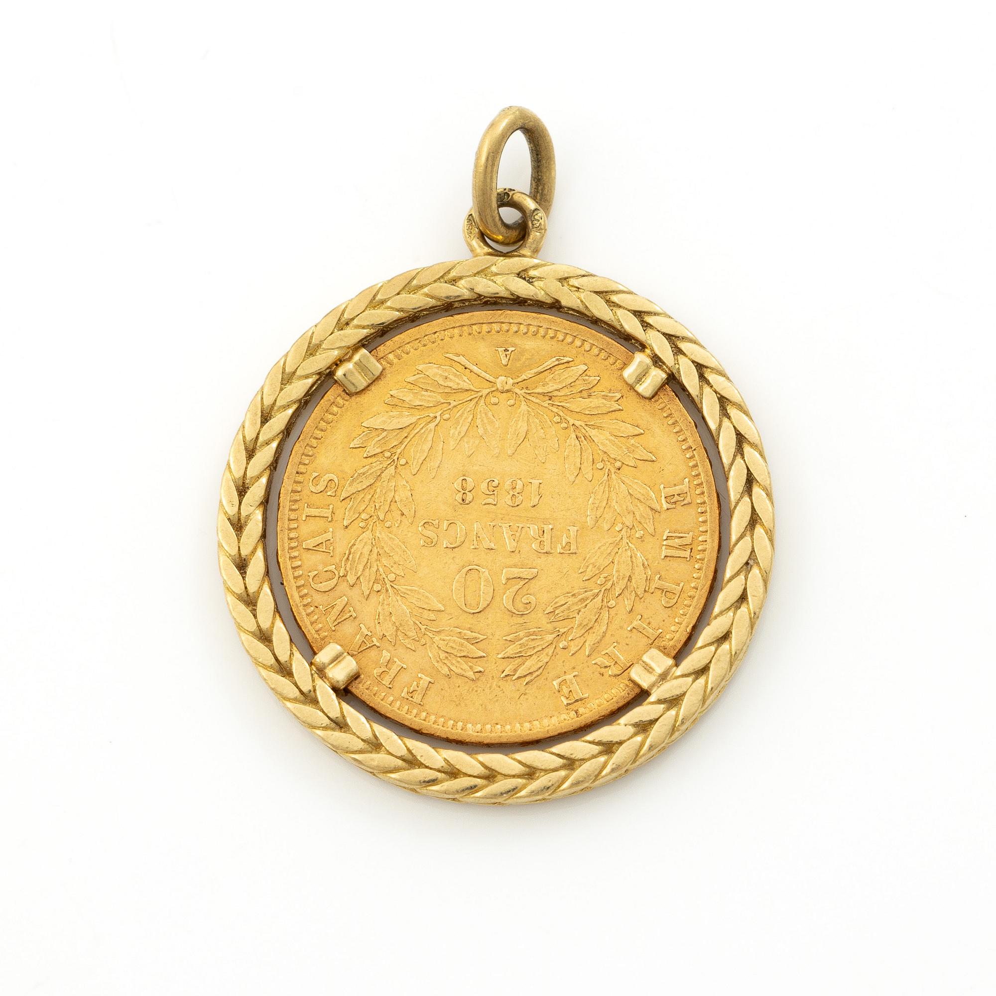 Gold coin, France, Napoleon III, 20 Francs, 1858, set in an 18-carat gold surround.