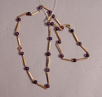 HALSBAND o ARMBAND, guld 18 K, m violetta stenar.