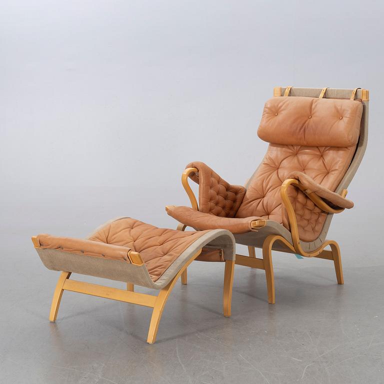 BRUNO MATHSSON, "Pernilla" armchair and stool from DUX.