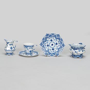 A 39-piece porcelain coffee set, 'Musselmalet', mostly full lace, Royal Copenhagen, Denmark.