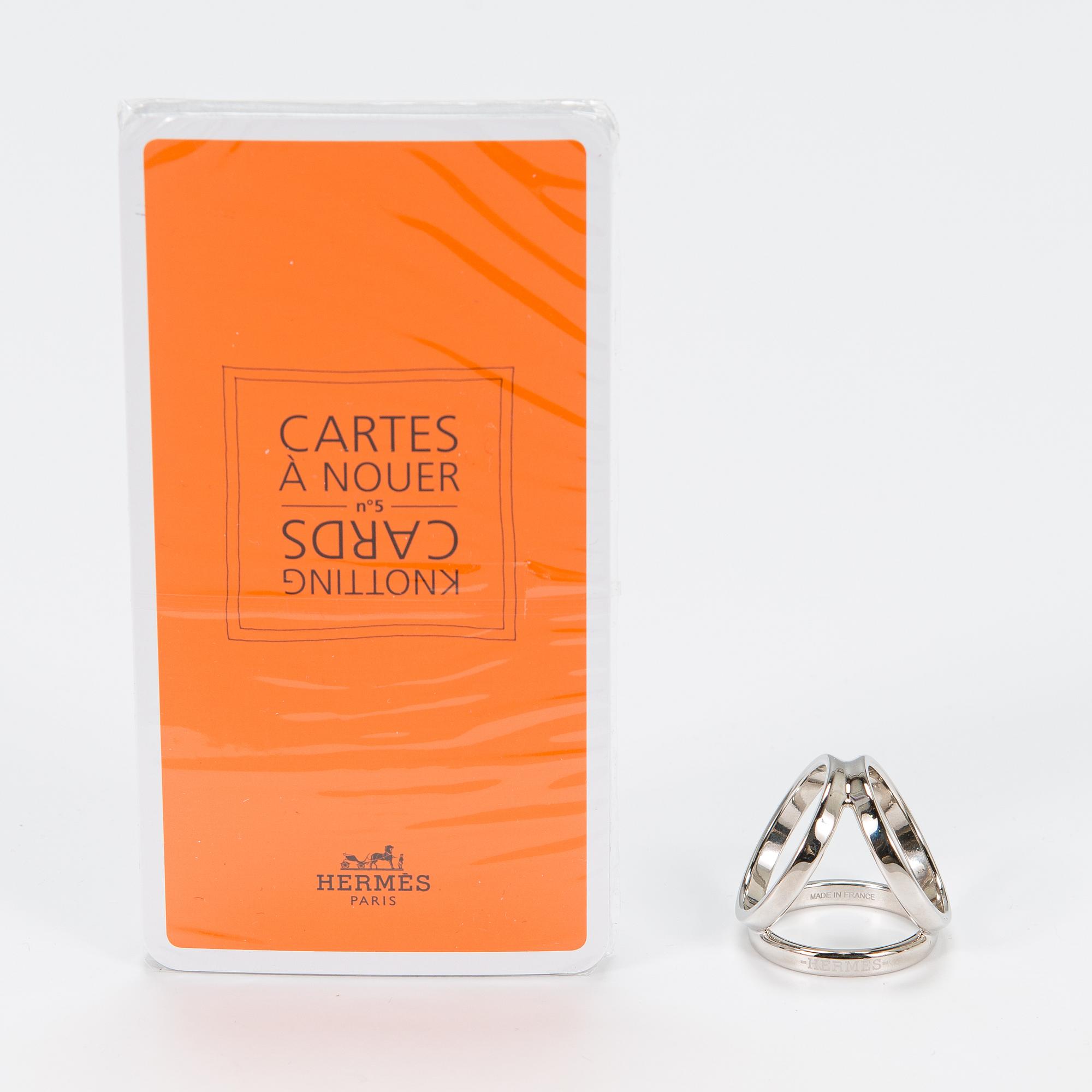 Hermès, 'Robe du soir' scarf and a Hermès scarf ring.