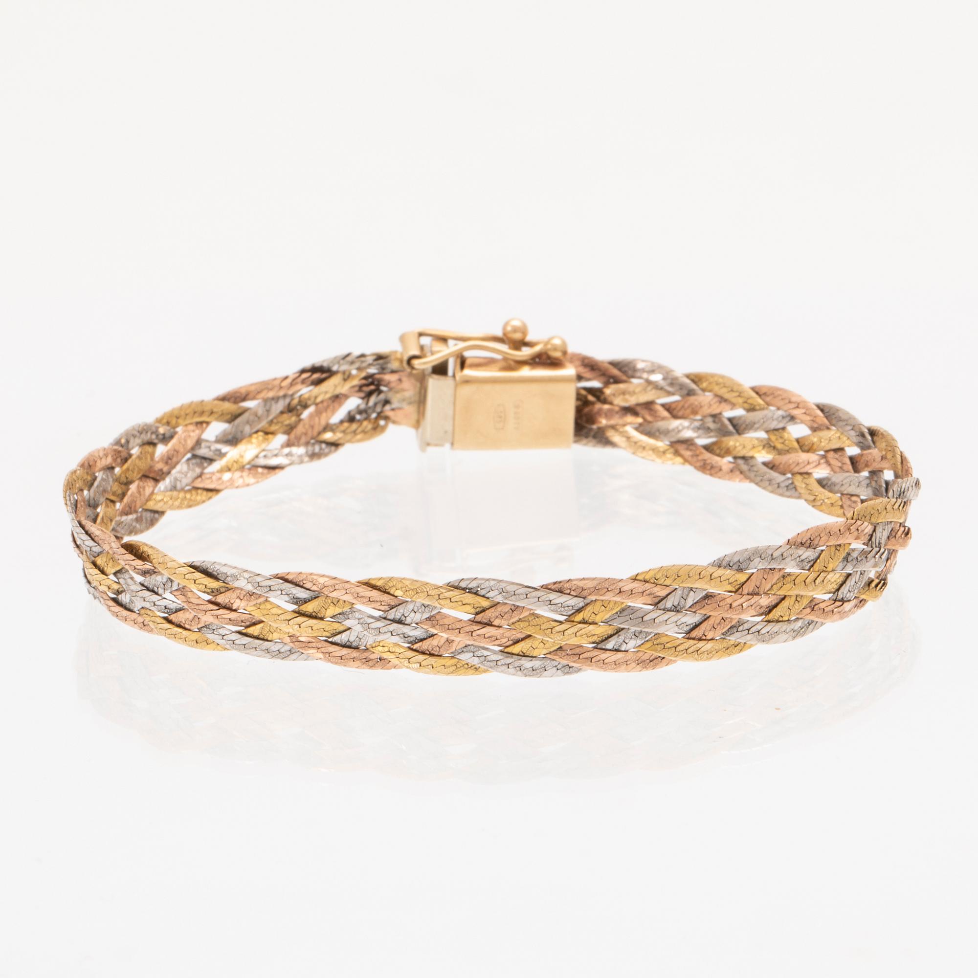 A 14K gold bracelet.
