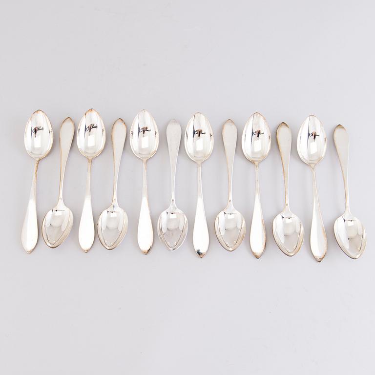 A 1920s 88-piece set of silver cutlery and 12 knife handles, Warsaw Poland.