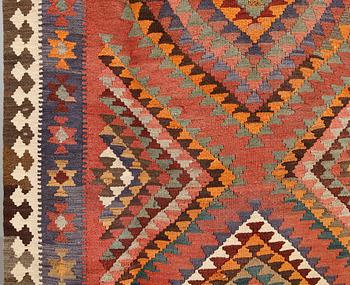 A persian nomadic kilim, approximately 420 x 190 cm.