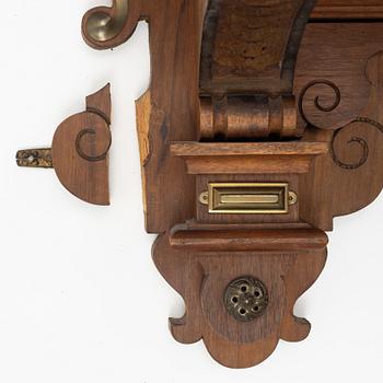 A 19th Century wall clock.