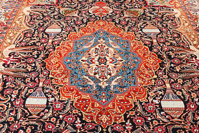 A Kashmar carpet, c. 390 x 305 cm.