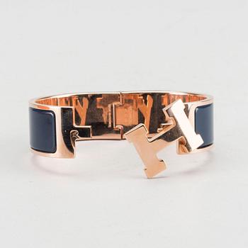 A Hermès "Clic-H" bracelet.