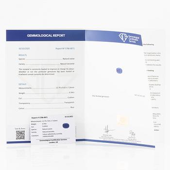 Ring, Fred Leighton platinum with an oval faceted tanzanite and fancy-cut diamonds.