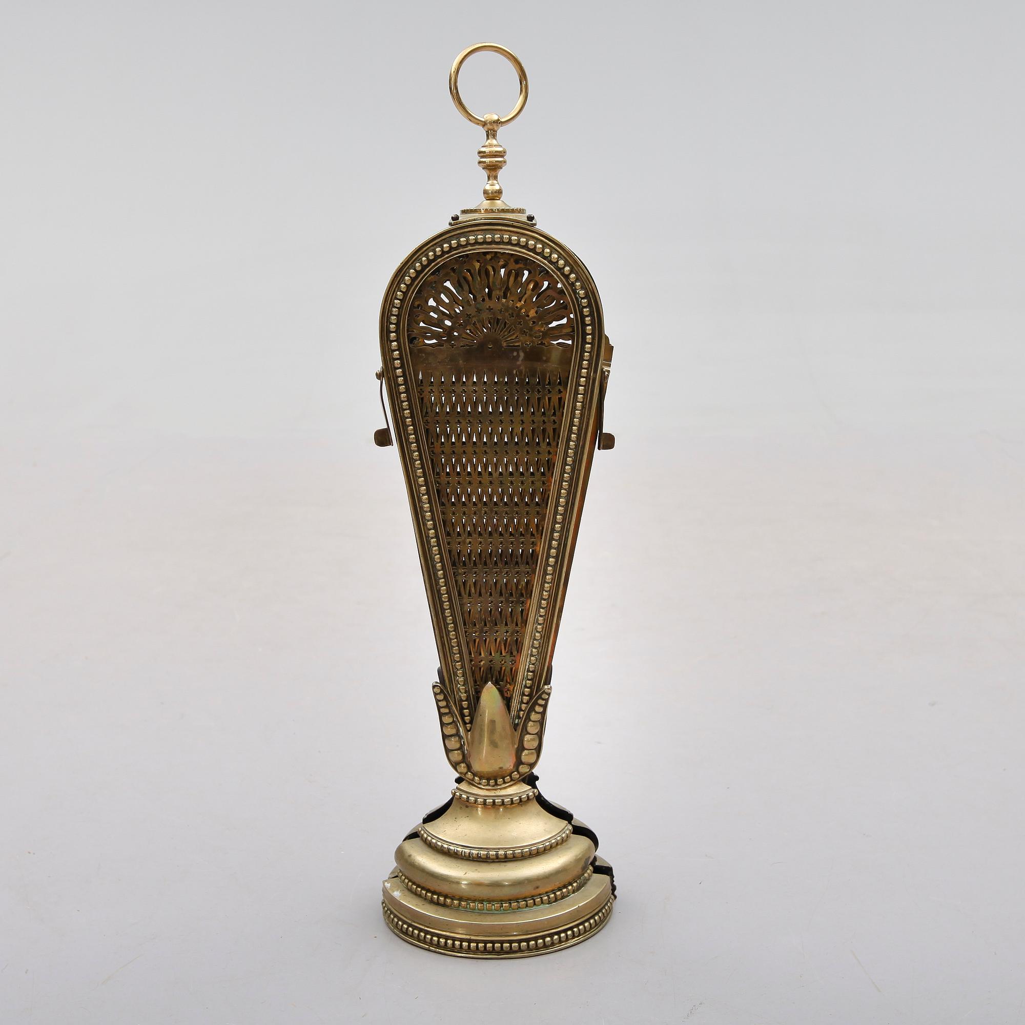BRASSKYDD, mässing, 1900-talets första hälft.
