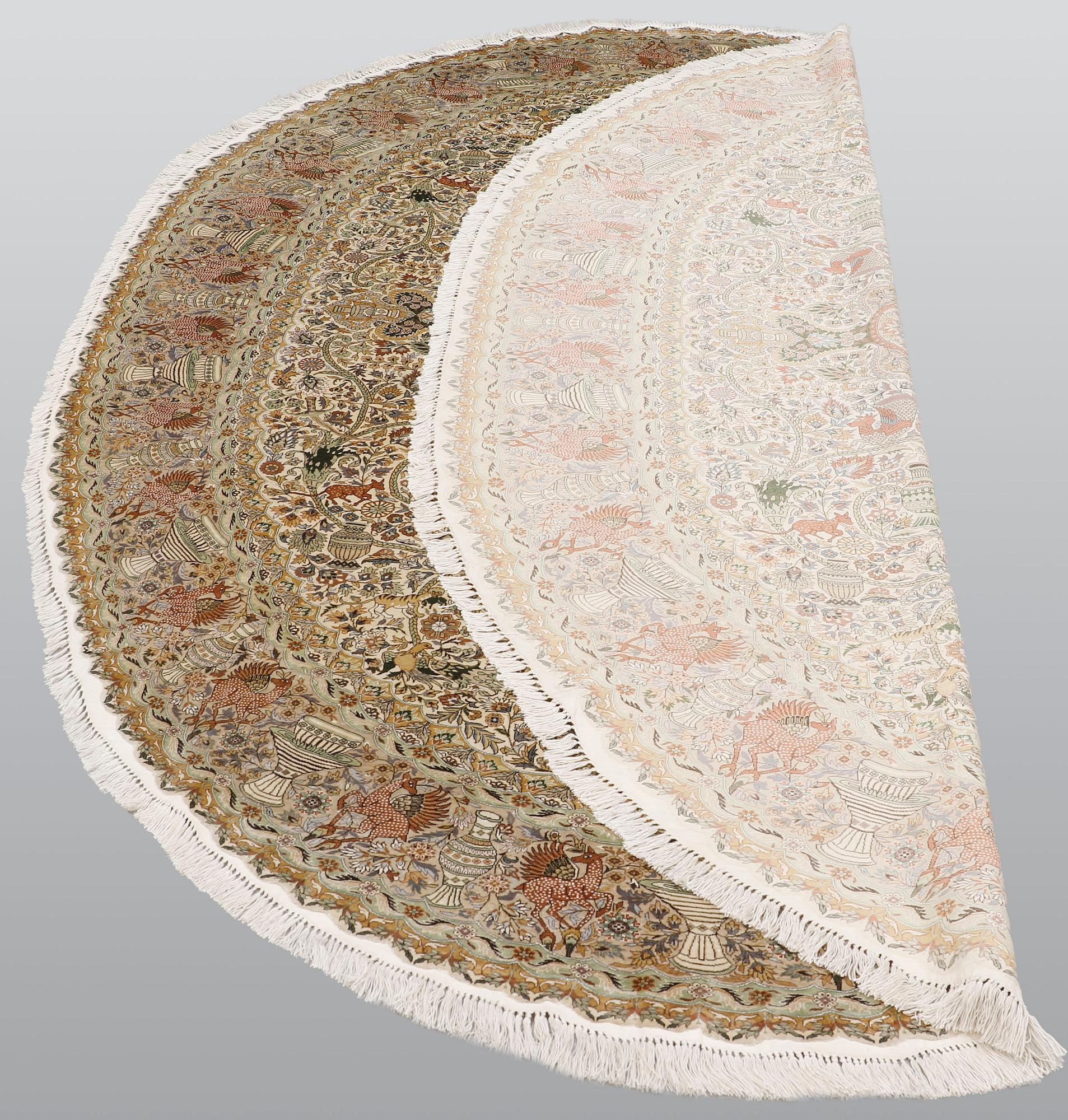 An oval pictoral silk carpet, ca 273 x 180 cm.