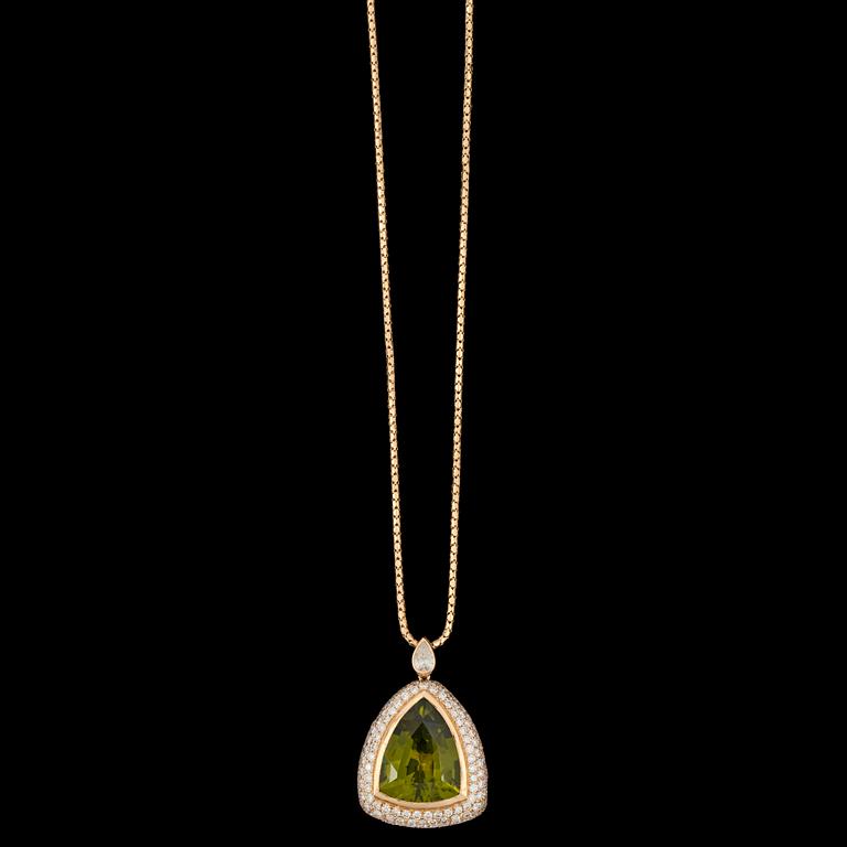 A peridote, 7.84 ct and brilliant cut diamond pendant, tot. 2.09 cts.