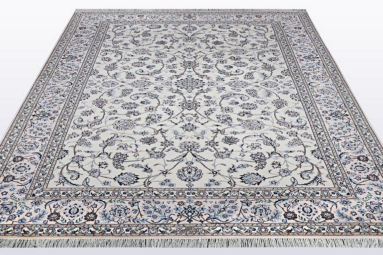 A carpet, Nain, part silk, 6 Laa, ca 301 x 203 cm.