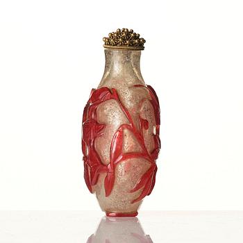 A red overlay Beijing glass snuff bottle, Qing dynasty.