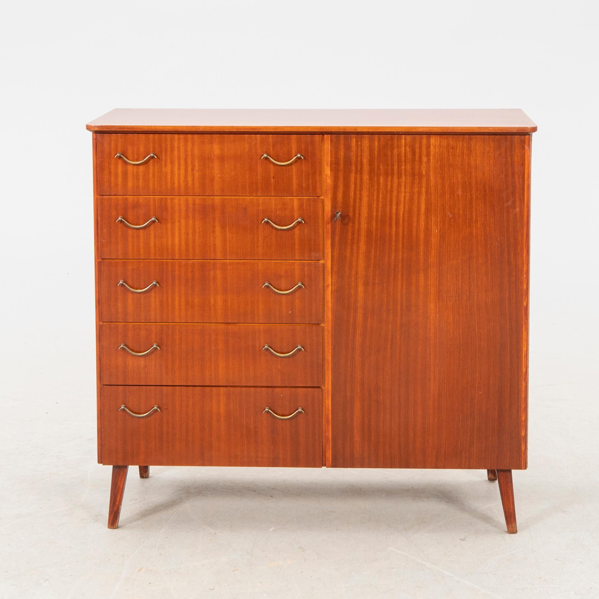A 1950s teak sideboard/cabinet.