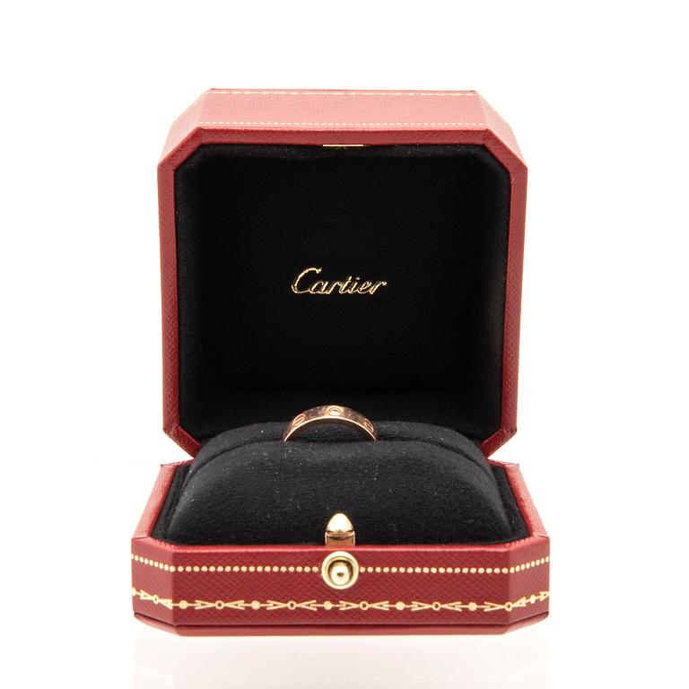 Cartier, ring 18K guld med en rund briljantslipad diamant.