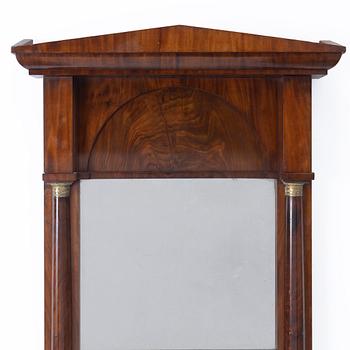 A Late Empire style mirror with a console table, second half of the 19th century.