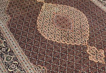 A CARPET, Tabriz part silk , so called 40 Radj, ca 298 x 202 cm.