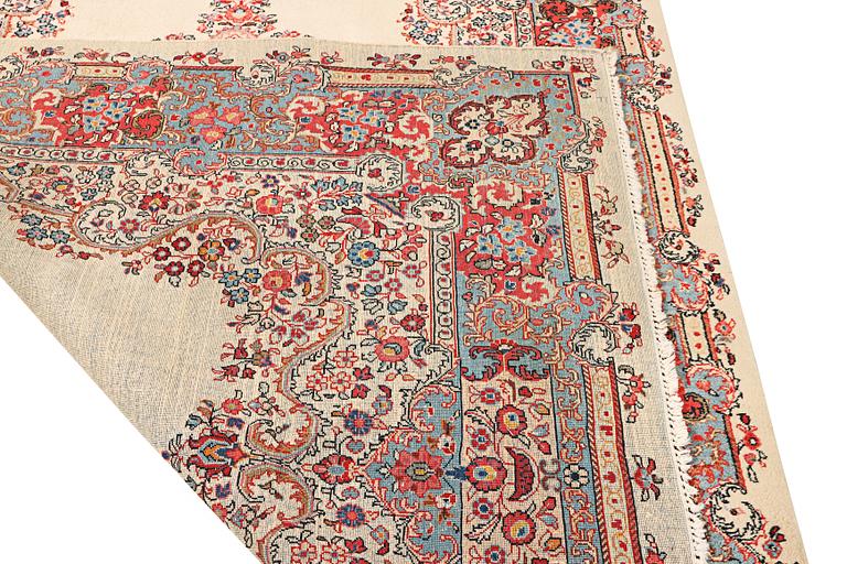 A Kerman carpet, c. 270 x 187 cm.
