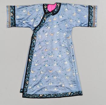 128. A Chinese embroided silk gown, around 1900.